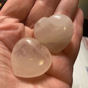 Two rose quartz hearts